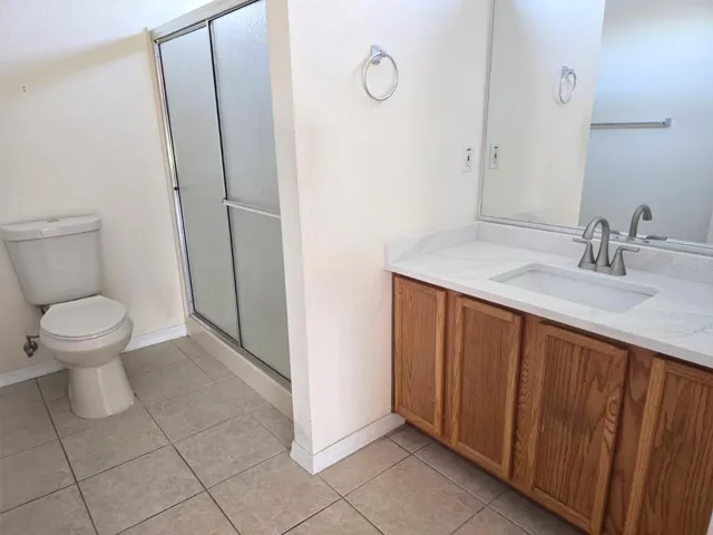 Master Bathroom with Walk-In Shower & Tile Flooring