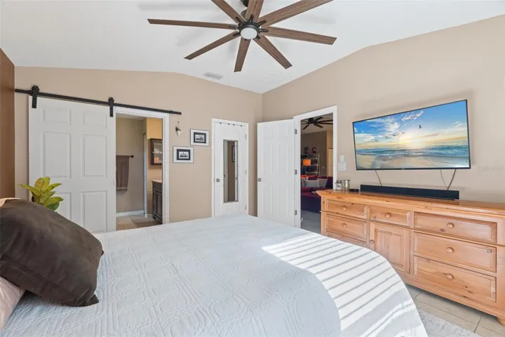 Primary bedroom with walk-in closet
