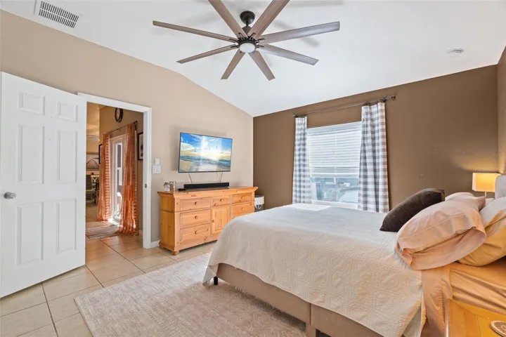 Primary bedroom with walk-in closet