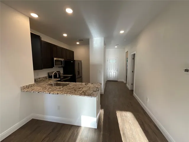 Hallway to and kitchen