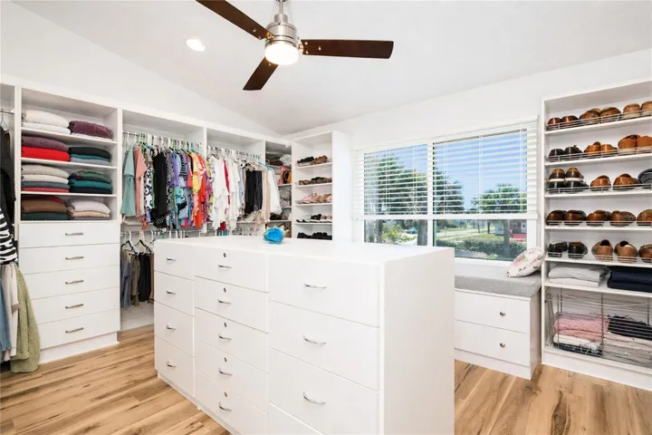 Primary suite walk-in closet.