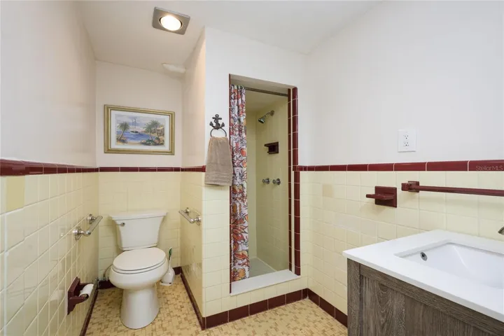 Lower level: The only room preserved from the original home, offering a sense of nostalgia and timeless charm. Beautifully maintained and thoughtfully kept true to its original debut, it stands as a rare and authentic reflection of the home’s history.