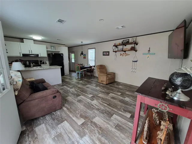 Open concept living dinning kitchen