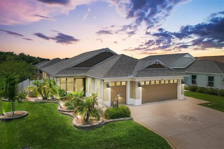 WELCOME TO 5554 MILLICAN AVE*CORNER LOT*PAINTED DRIVEWAY-WALKWAY-PORCH*GOLF CART GARAGE*BEAUTIFUL LANDSCAPING*EXTERIOR LIGHTING