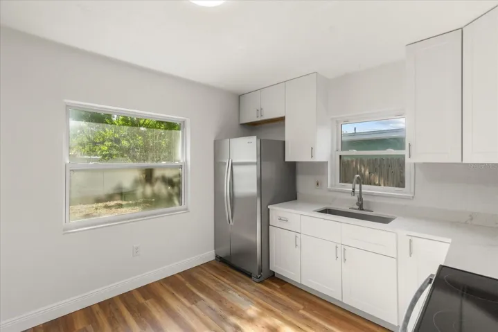 Kitchen w/rear and side windows