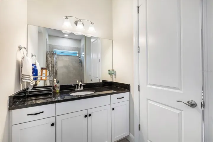 Bathroom #3 that leads out to back lanai