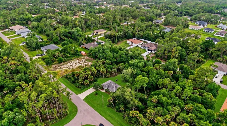 Final aerial overview of property and neighborhood