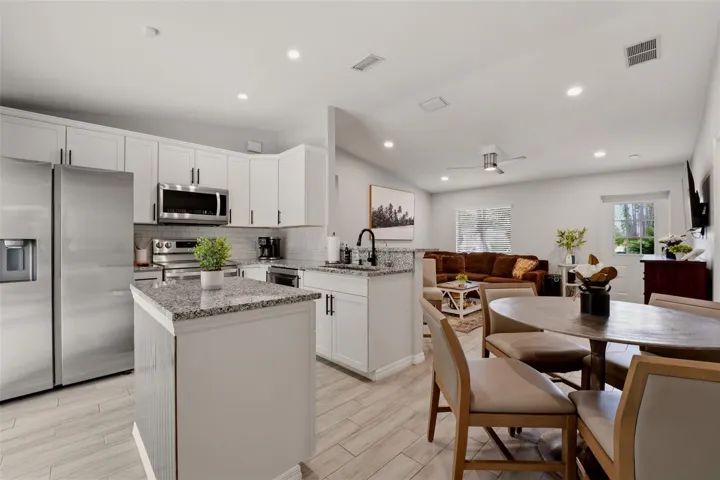 Kitchen with large island and bar seating