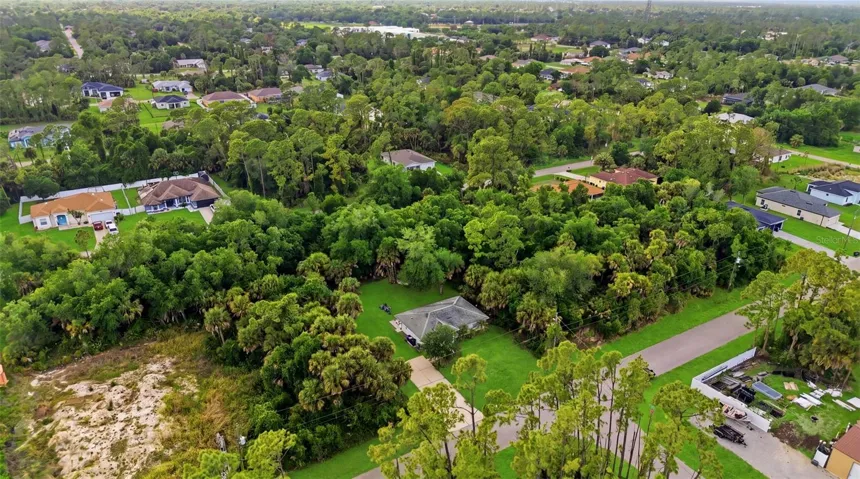 Wide aerial view of surrounding community