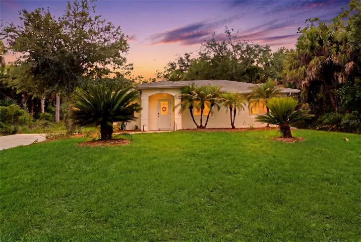 Front exterior with mature landscaping and inviting curb appeal