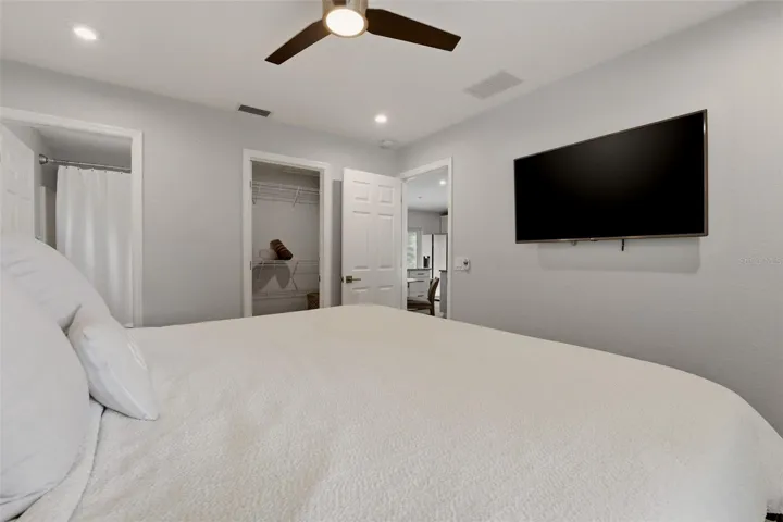 Primary bedroom with spacious layout and walk-in closet