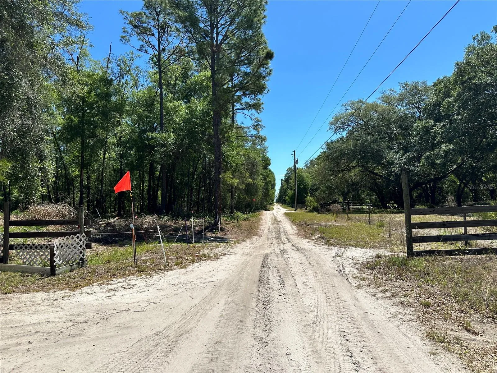 The flag signifies the neighbor's property.