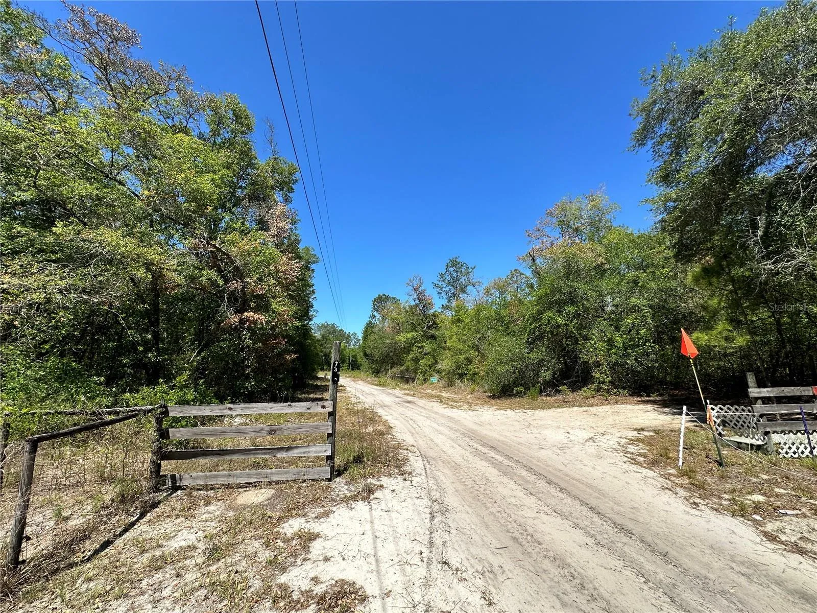 The property is beyond this point.