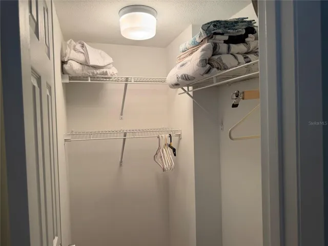 Primary Suite Walk in closet