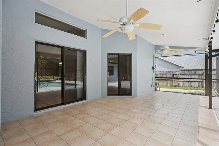 Spacious back patio waiting to entertain and enjoy the pool and spa