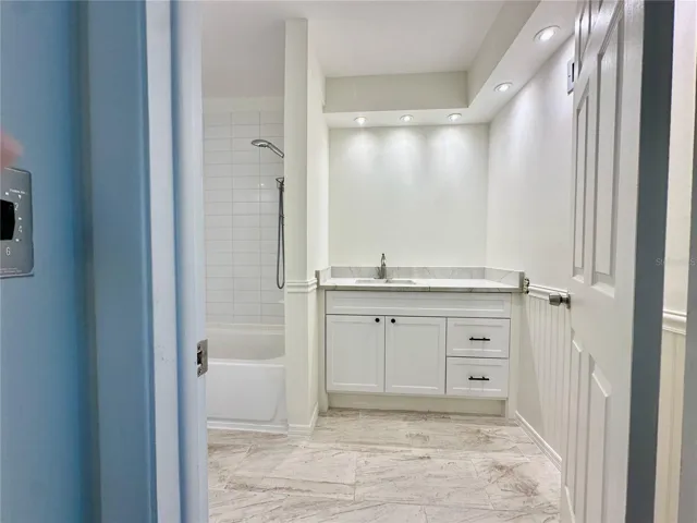 New tile floors, vanity and stone counter top