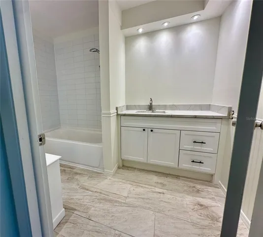 New tile floors, vanity and stone counter top