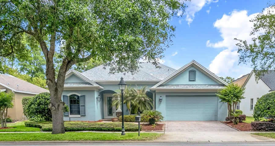 Exterior Front w/3 Car Tandem Garage