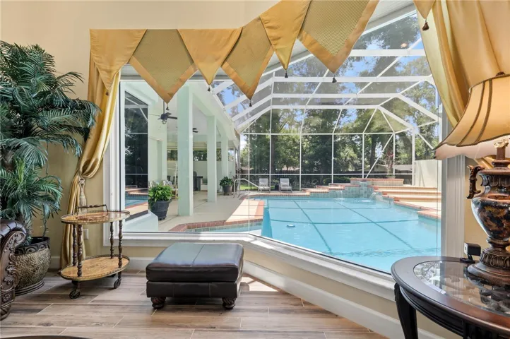 living room overlooking pool