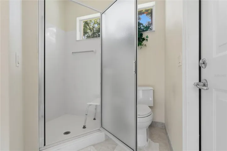 full pool bath with step-in s hower