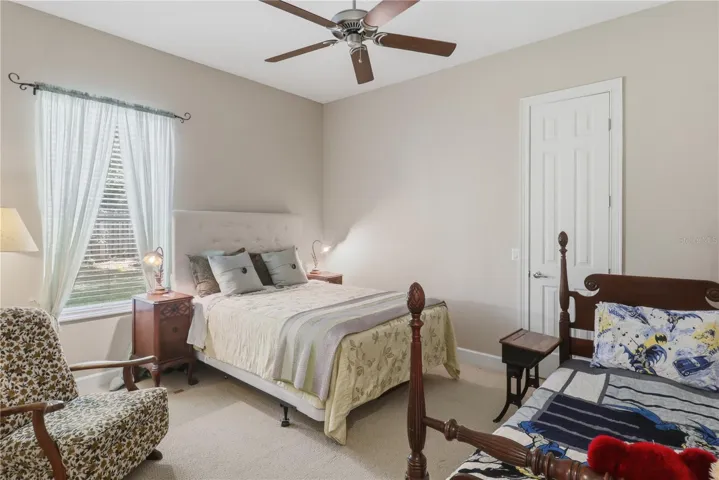 guest bedroom 2 with walk-in closet