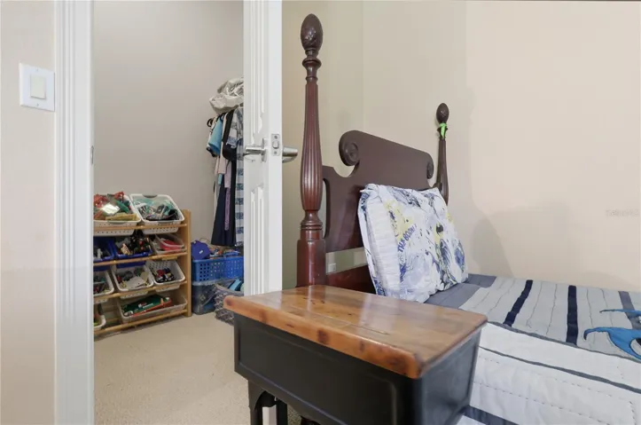 guest bedroom 2 with walk-in closet