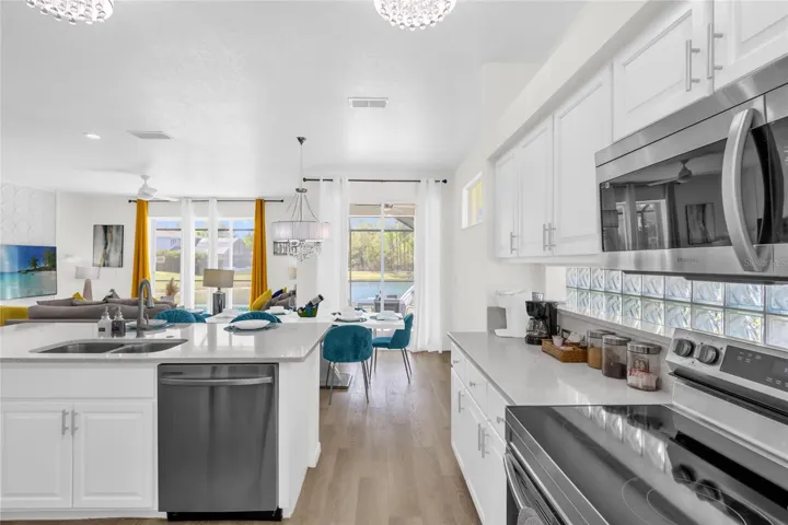 Well-appointed kitchen featuring stainless steel appliances, generous counter space, and a convenient layout designed for everyday living