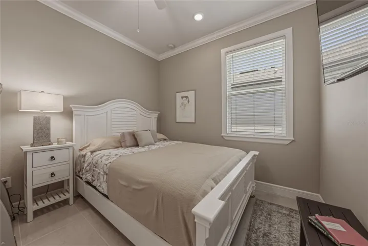 Second Bedroom with Crown Molding and upgraded Lighting Package