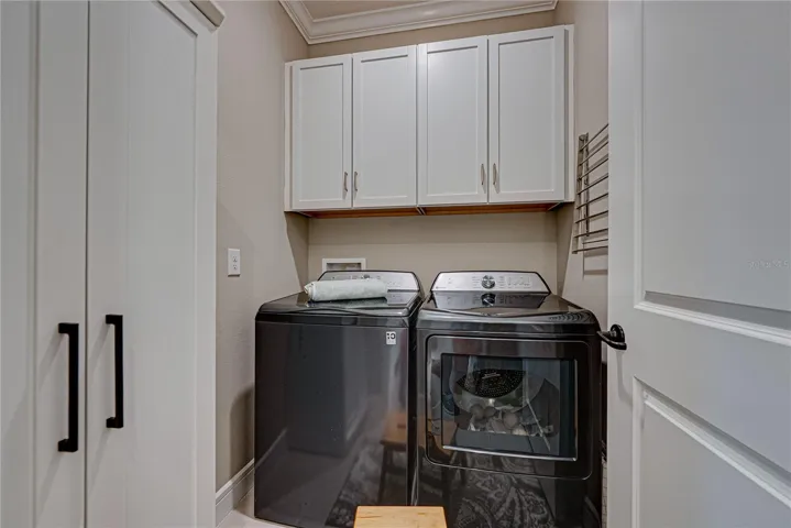 Dedicated Laundry Room w/Built ins & 42