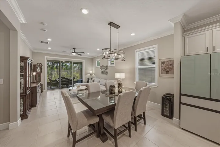 Dining Area with Crown Molding and Upgraded lighting package