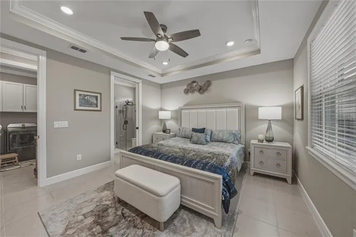 Oversized Primary Suite with King Bed & extra room for settee area long dresser and chair