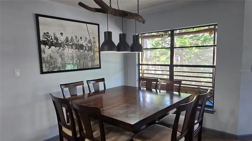 The dining room offers views of the outdoors.