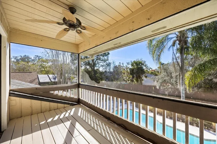 “Private shared balcony connecting bedrooms #2 and #3, showcasing serene lake views—perfect for morning coffee or evening relaxation.”