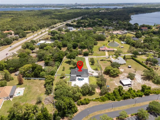 Expansive 2-acre property showcasing privacy, space, and resort-style living.