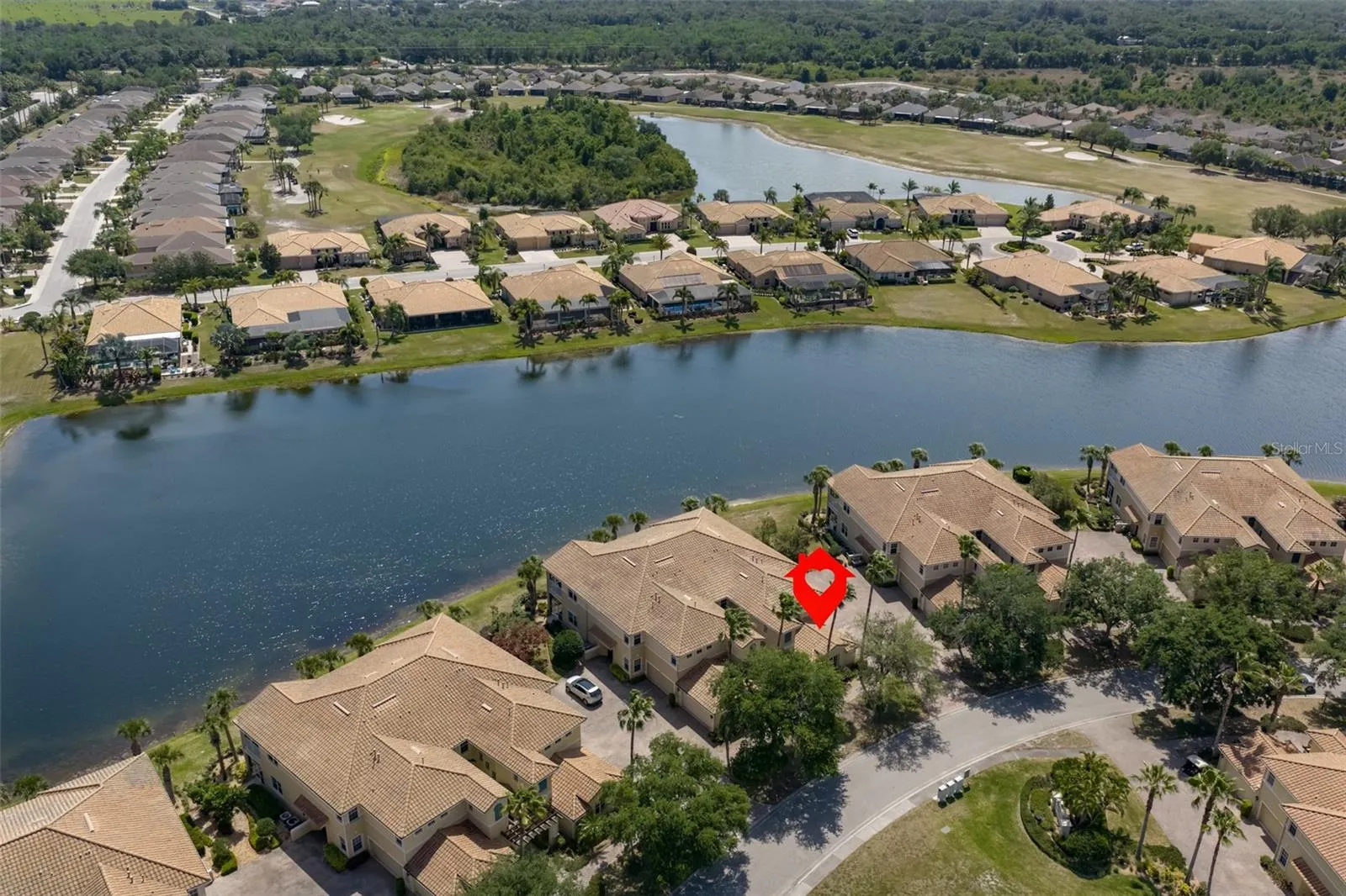 Aerial location showing just where home is on the lake.  No homes across the street from home, just the mailboxes.