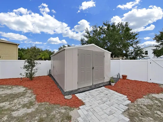 Backyard shed (9'x14'). Bonus storage for days! Keeps your garage free and your gear organized.