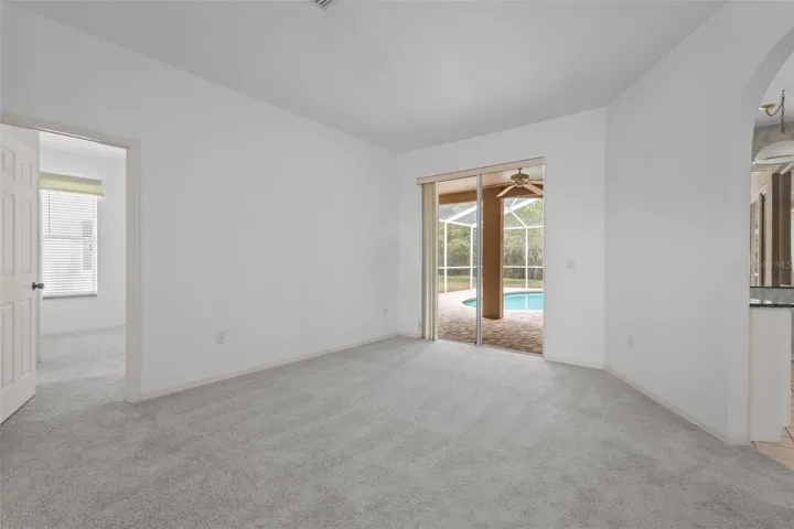 Entry opens directly into the great room with views of the pool and conservation
