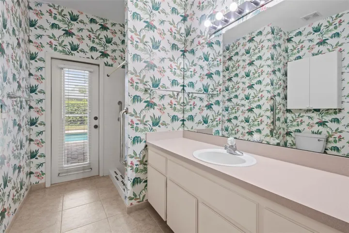 Bathroom 3 - has shower and serves as a pool bath with a door leading outside