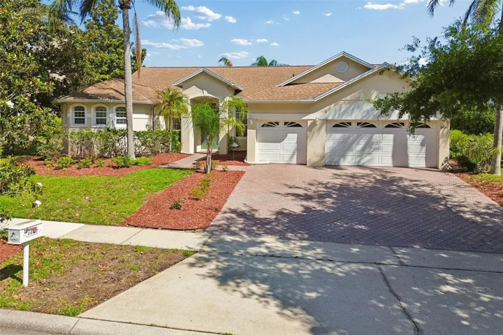 Welcome home! Paver drive and 3 Car Garage