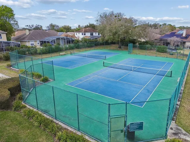 Residents of Emerald Forest enjoy community amenities including a pool, tennis courts, and a lakefront dock on Lake Crowell for fishing