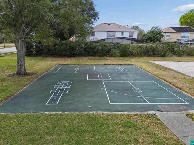 Residents of Emerald Forest enjoy community amenities including a pool, tennis courts, and a lakefront dock on Lake Crowell for fishing