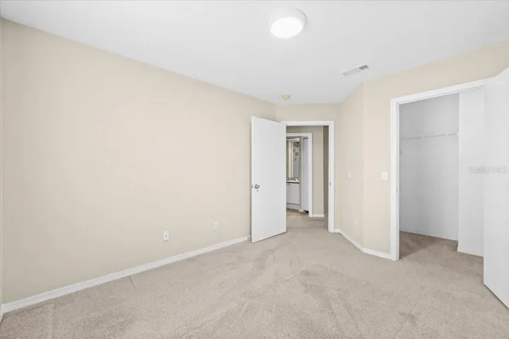 3rd bedroom with walk in closet