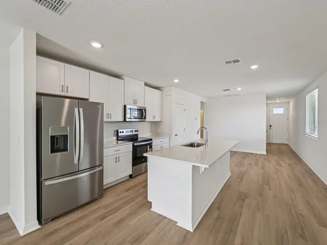 Interior photos are not of the actual home but are photos of the builder home with the same floorplan with similar interior finishes and features.