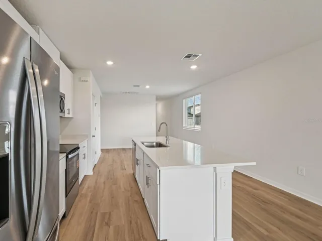 Interior photos are not of the actual home but are photos of the builder home with the same floorplan with similar interior finishes and features.