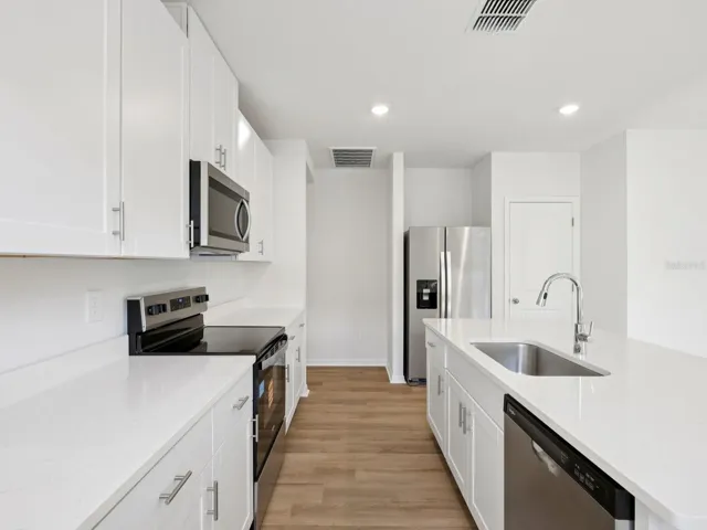 Interior photos are not of the actual home but are photos of the builder home with the same floorplan with similar interior finishes and features.