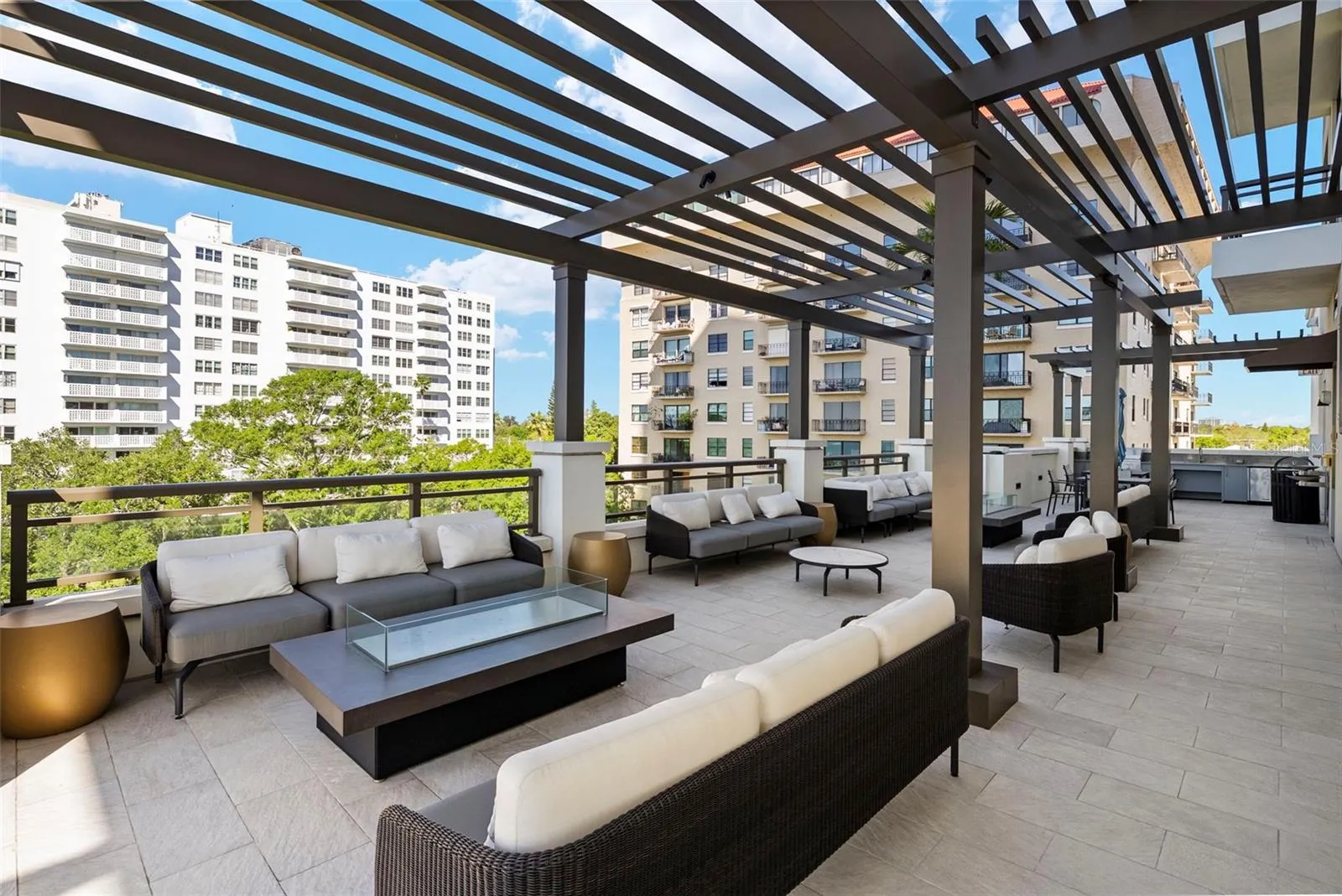 Outdoor gathering space and gril area located on the amenties deck
