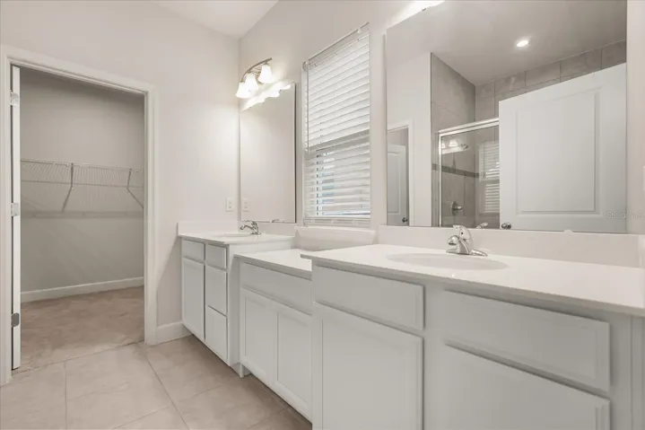PRIMARY BATHROOM & WALK-IN CLOSET