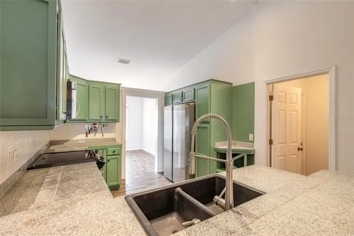 Kitchen opens to dining room and living room