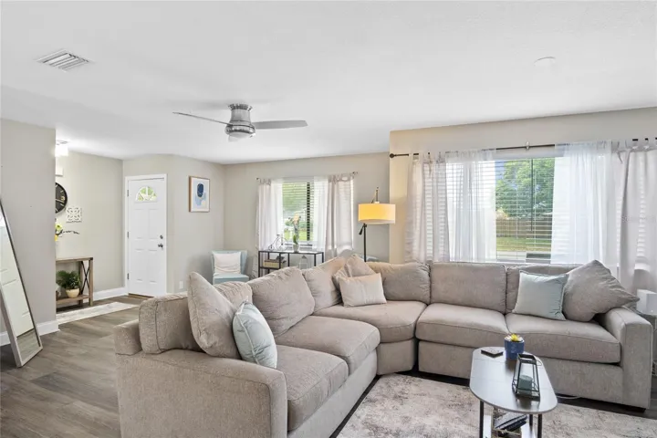 The living room is located off of the entrance to the home and faces the east.