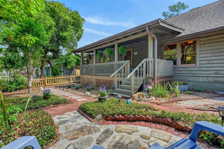 Showing off the front yard and the large front porch